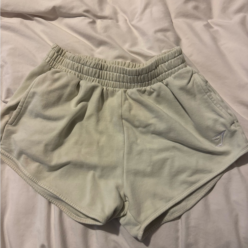 Gymshark pale yellow sweat shorts